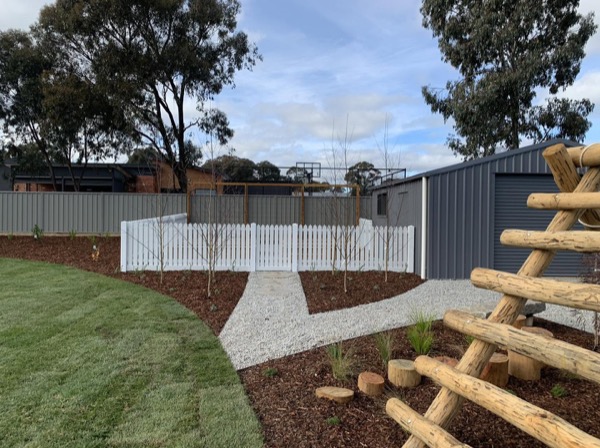 Timber log edging and steps built into a new landscaped bank